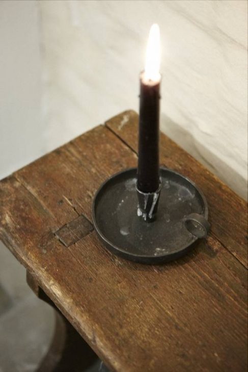 candle on wood